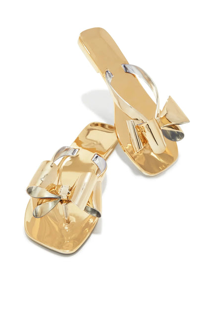 Lyla gold metallic flat sandals with decorative bow detail and square toe for stylish women‚Äôs footwear